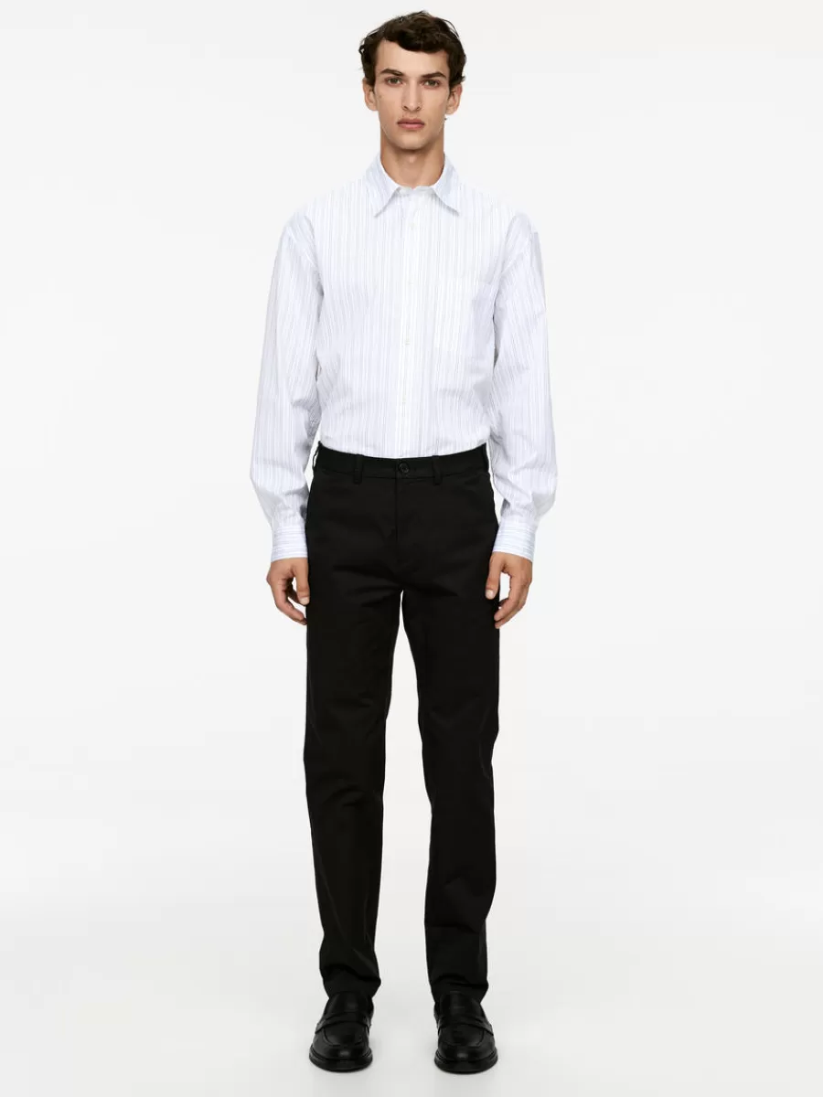 Pantalons-ARKET Pantalon chino slim en stretch Noir