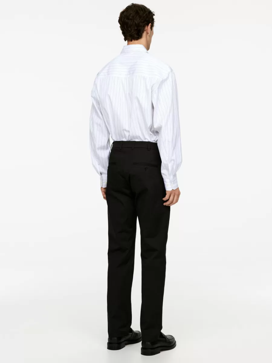 Pantalons-ARKET Pantalon chino slim en stretch Noir